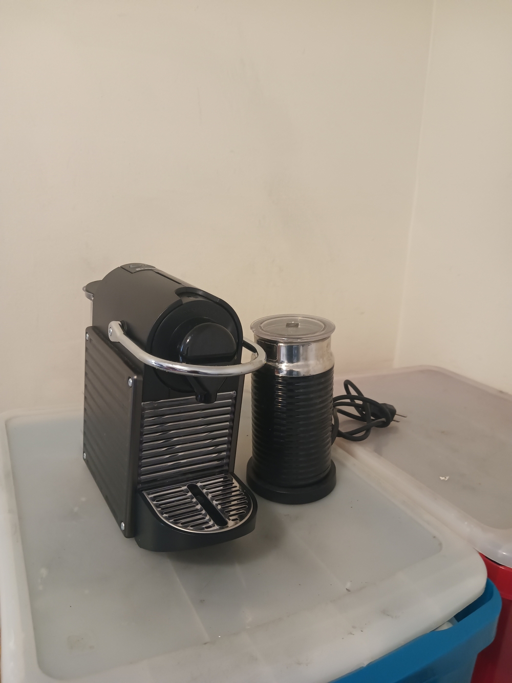 Compact Black Capsule Espresso Machine with Matching Black Milk Frother
